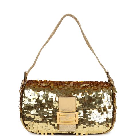 vintage fendi baguette gold hardware.